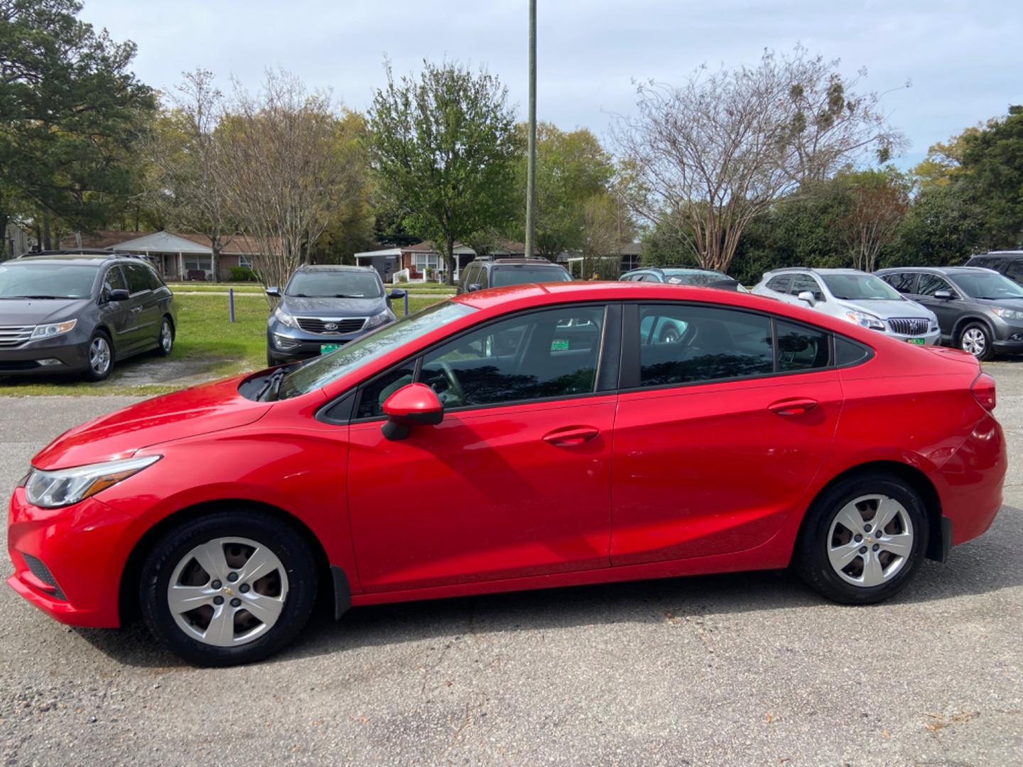 2016 RED CHEVROLET CRUZE LS AUTO (1G1BC5SM7G7) with an 1.4L engine, Automatic transmission, located at 5103 Dorchester Rd., Charleston, SC, 29418-5607, (843) 767-1122, 36.245171, -115.228050 - Photo#3